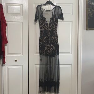 Sheer black lace evening gown